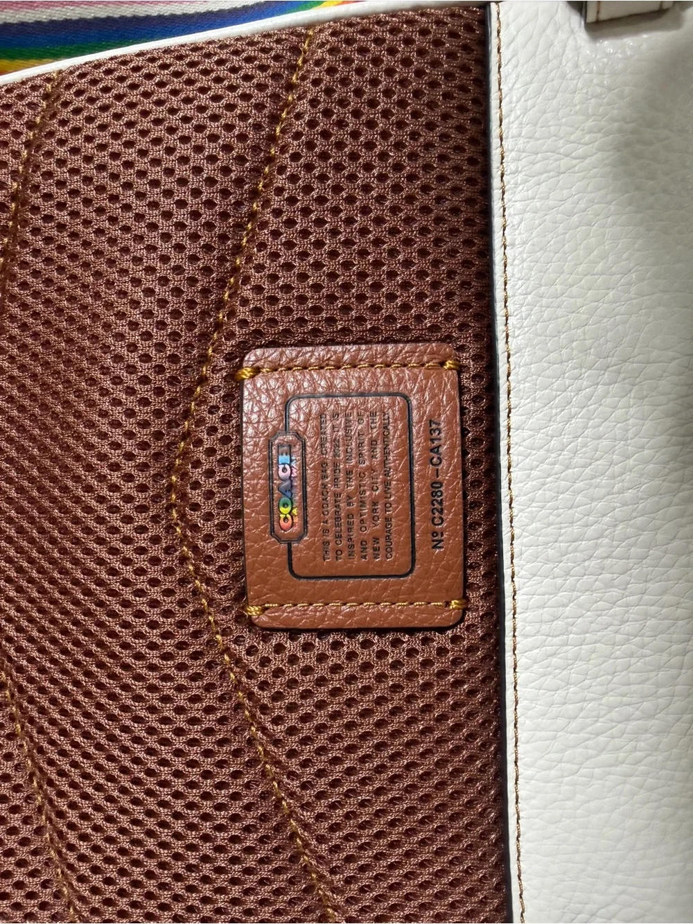 Coach White Mini Backpack with Brown Interior and Rainbow Strap